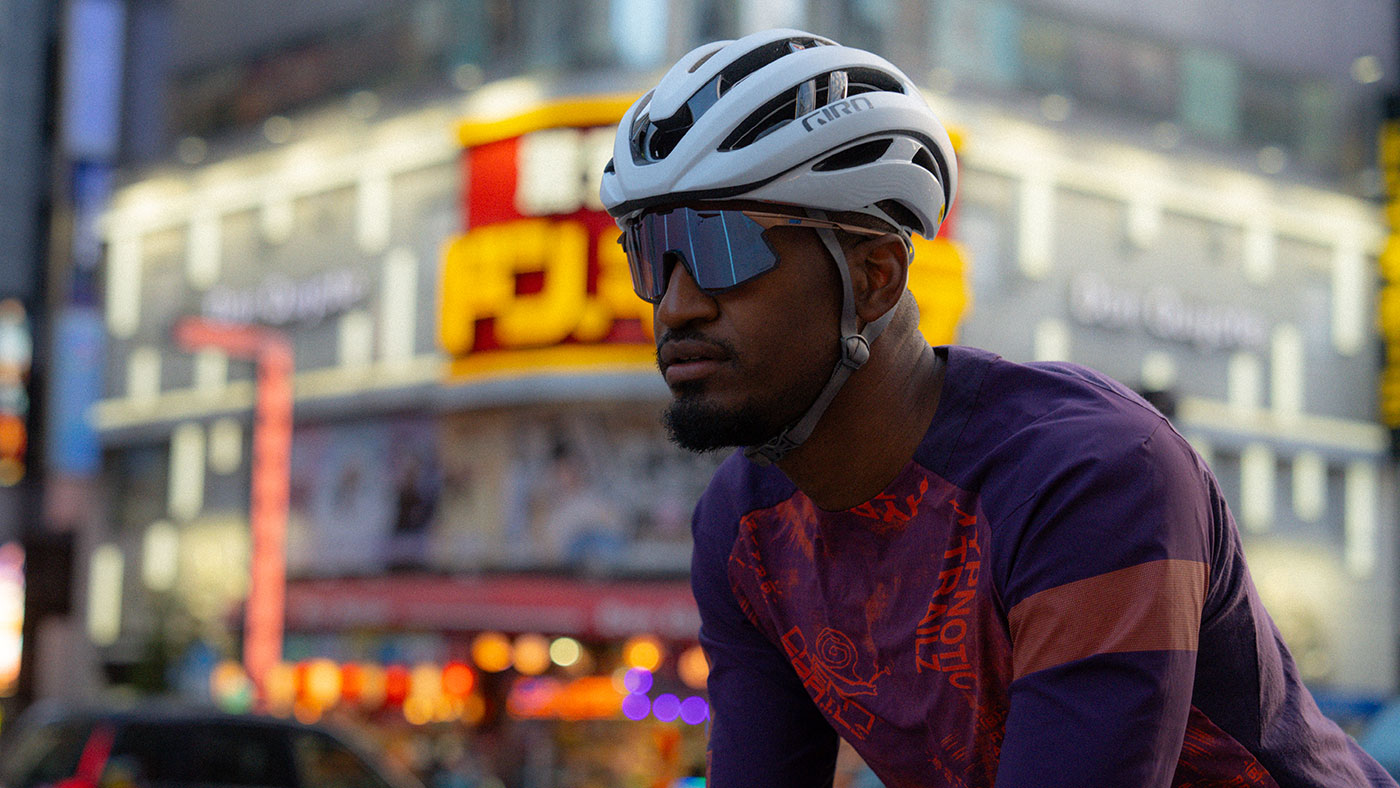 Close up of Andrew Jacksons head while riding a bicycle